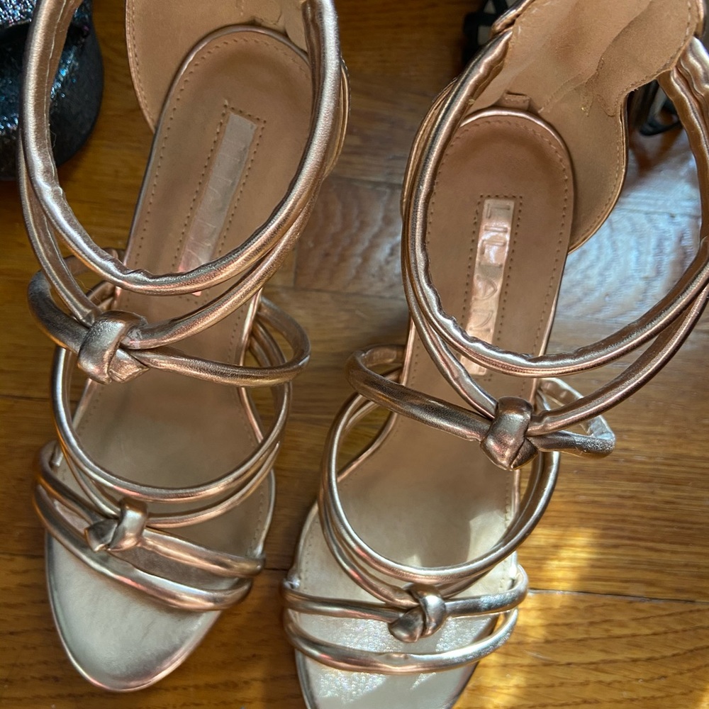 Gold strappy heels